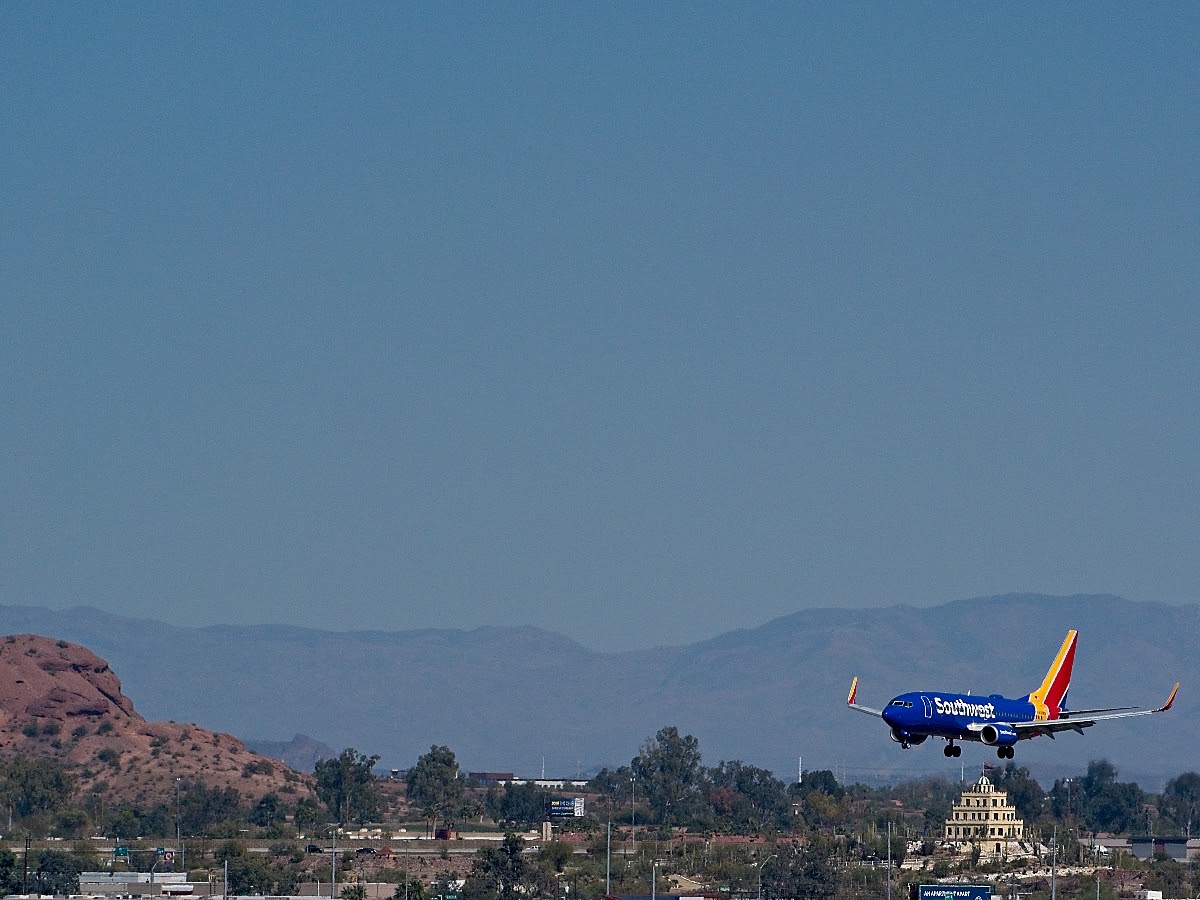 Southwest 737 landing above Tovrea Castle